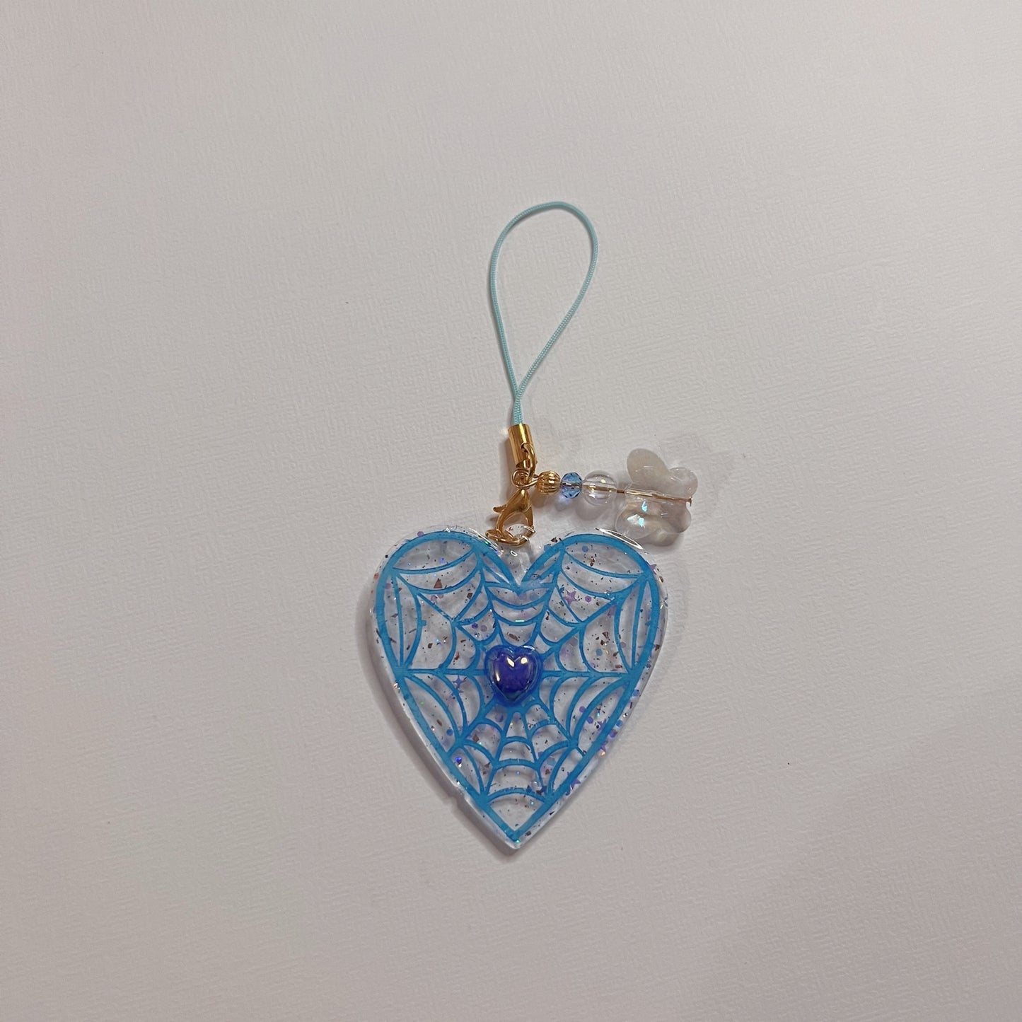 Heart spider web phone strap